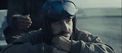 Bearded Man In Helmet And Goggles Smoking Cigarette GIF