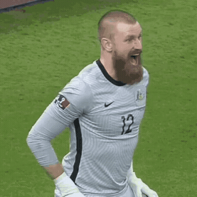 Bearded Man In Jersey Number 12 GIF