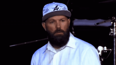 Bearded Man in LA Hat and White Shirt
