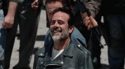 Bearded Man In Leather Jacket Smiling Being Held GIF