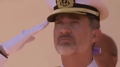 Bearded Man In Navy Hat Salutes GIF