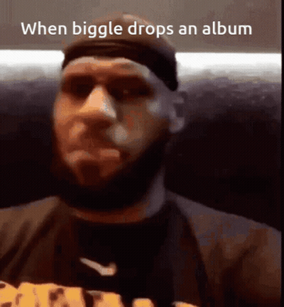 Bearded Man In Nike Shirt And Headband GIF