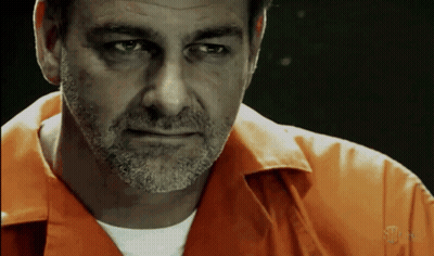 Bearded Man In Orange Shirt Saying Showtime GIF