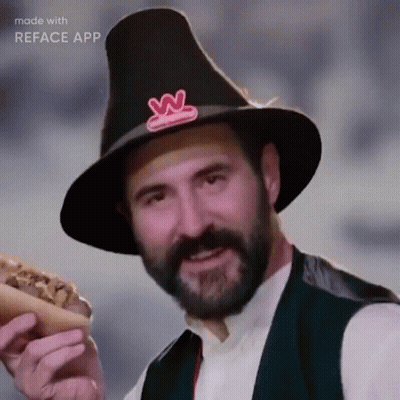 Bearded Man In Pilgrim Hat Holding Hot Dog GIF
