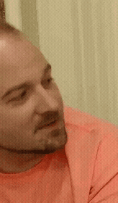 Bearded Man In Pink Shirt Making Face GIF