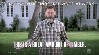 Bearded Man In Plaid Shirt Standing In Field GIF