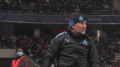 Bearded Man In Puma Jacket And Beanie With Letter O GIF