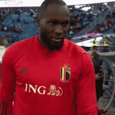 Bearded Man In Red Adidas Shirt At Stadium GIF