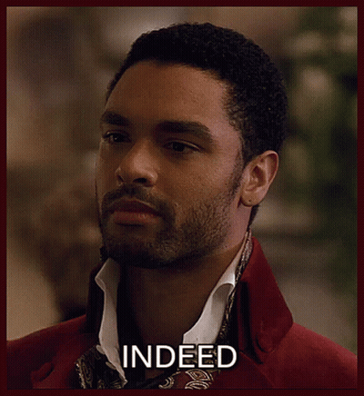 Bearded Man In Red Jacket And Scarf Saying Indeed GIF