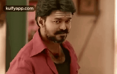 Bearded Man In Red Shirt Making Funny Face GIF