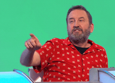 Bearded Man in Red Shirt Pointing