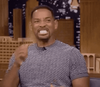 Bearded Man In Red Shirt Smiles GIF