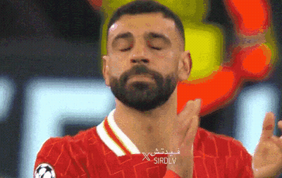 Bearded Man In Red Shirt With Arabic Writing GIF
