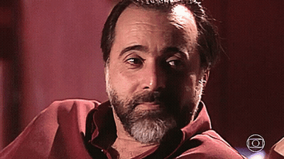 Bearded Man In Red Shirt With Circle Around Head GIF