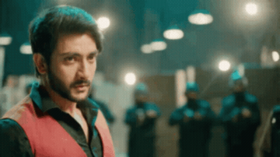 Bearded Man In Red Vest Before Police GIF
