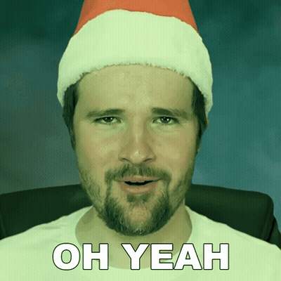Bearded Man In Santa Hat Saying Oh Yeah GIF