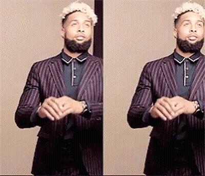 Bearded Man In Striped Suit Jacket GIF