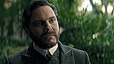 Bearded Man In Suit And Tie Looking At Camera GIF