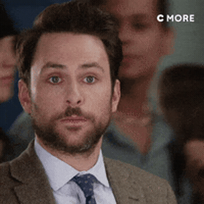 Bearded Man In Suit And Tie Looking At Camera GIF