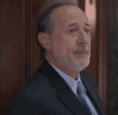 Bearded Man In Suit And Tie Looking At Camera GIF