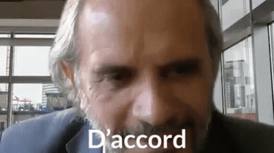 Bearded Man In Suit By Window GIF