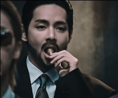 Bearded Man In Suit Eating Food GIF