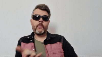 Bearded Man In Sunglasses And Black Pink Shirt GIF