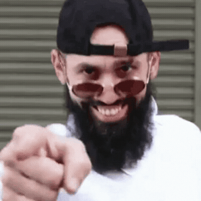 Bearded Man In Sunglasses And Hat Pointing At Camera GIF