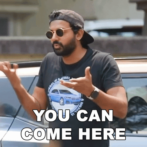 Bearded Man In Sunglasses And Hat Says You Can Come Here GIF