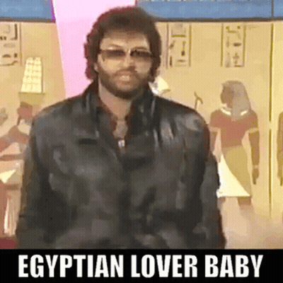 Bearded Man In Sunglasses And Leather Jacket By Egyptian Writing GIF