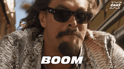 Bearded Man In Sunglasses And Snakeskin Coat Says Boom GIF