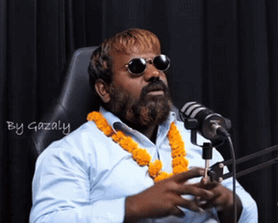 Bearded Man In Sunglasses At Microphone With Gazaly GIF
