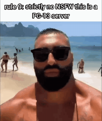 Bearded Man In Sunglasses On Beach With People GIF