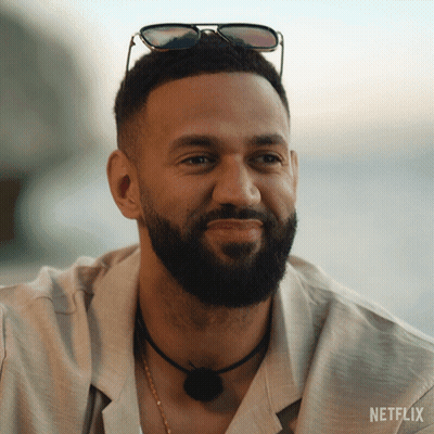 Bearded Man In Sunglasses With Netflix Necklace GIF