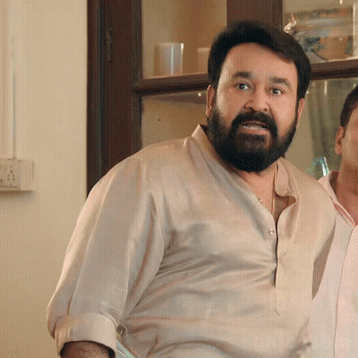 Bearded Man In Tan Shirt GIF