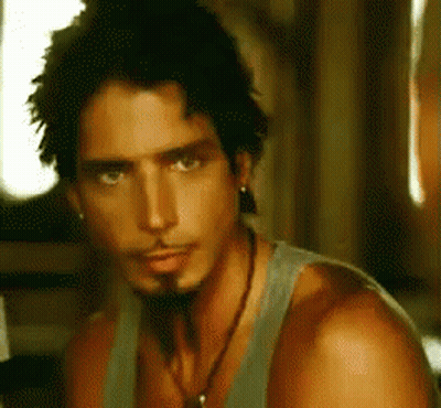 Bearded Man In Tank Top With Earrings GIF