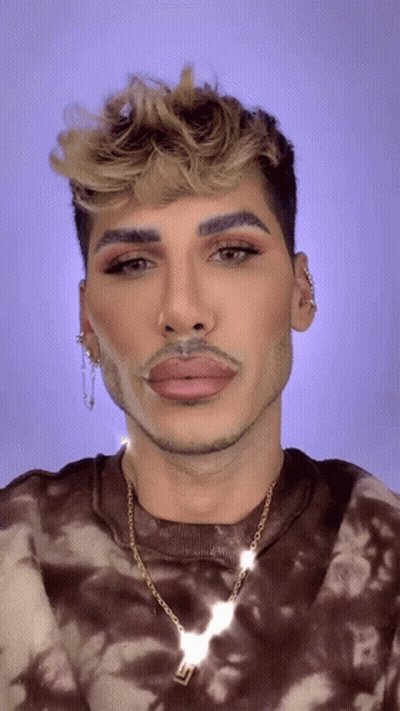 Bearded Man In Tie Dye Shirt And Gold Necklace GIF