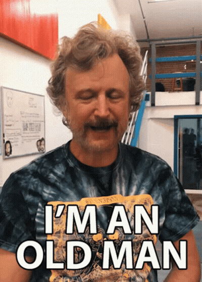 Bearded Man In Tie Dye Shirt Saying I'm An Old Man GIF