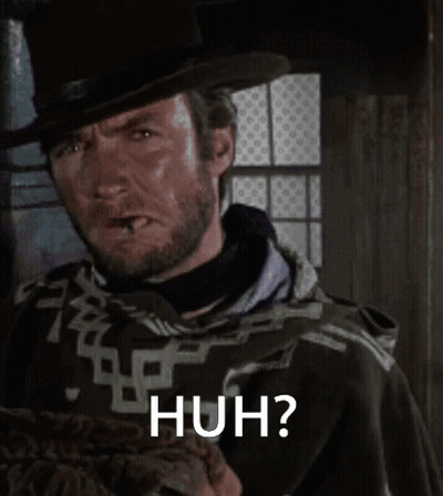 Bearded Man In Top Hat And Cape Saying Huh GIF