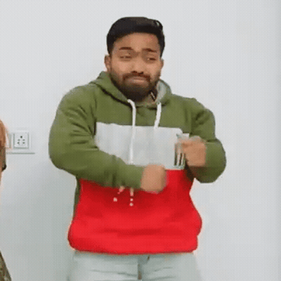 Bearded Man In Tricolor Hoodie Dancing GIF