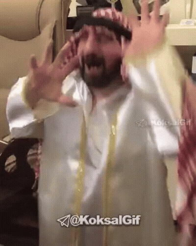 Bearded Man In Turban And White Robe GIF
