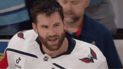 Bearded Man In White Hockey Jersey Smiling GIF