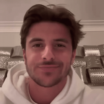 Bearded Man In White Hoodie Smiling GIF