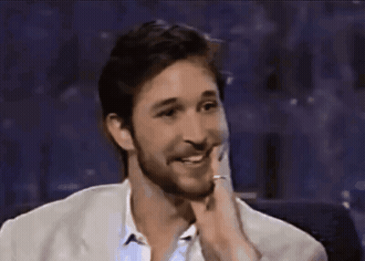 Bearded Man In White Jacket Smiling GIF