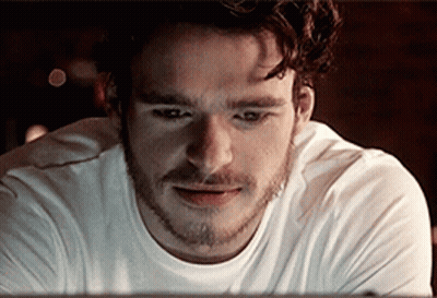 Bearded Man In White Shirt Looking GIF