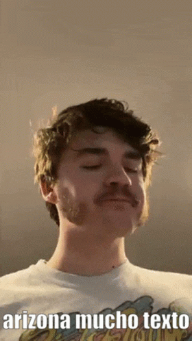 Bearded Man In White Shirt Saying Arizona Mucho Texto GIF