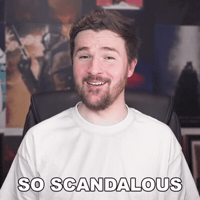 Bearded Man in White Shirt Saying So Scandalous