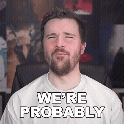 Bearded Man in White Shirt Saying We're Probably