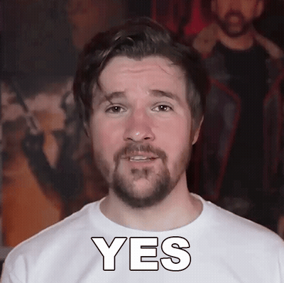 Bearded Man In White Shirt Saying Yes GIF