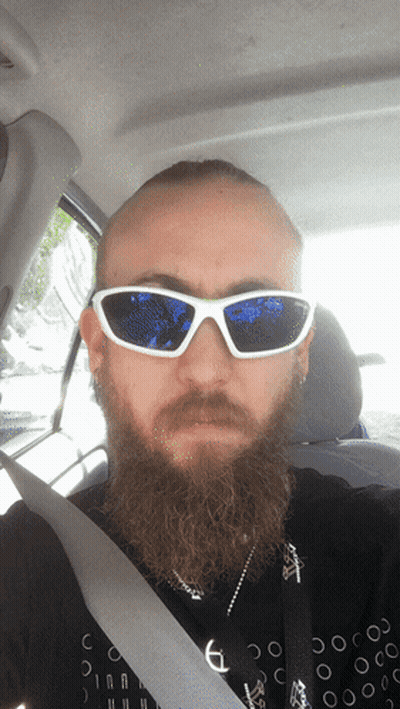 Bearded Man In White Sunglasses And Black Shirt With Letter C GIF